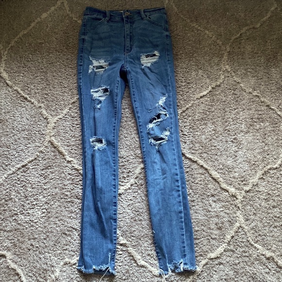 Size 0 blue ripped jeans from Garage - Picture 1 of 1
